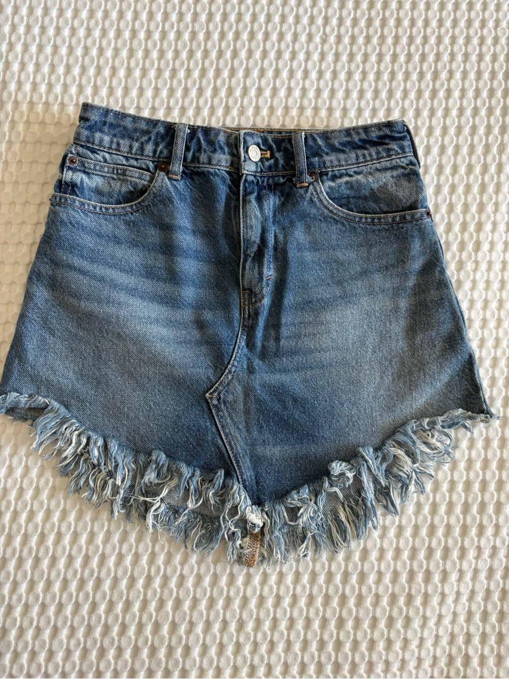 We The Free Distressed Blue Denim Mini Skirt with Fringe Hem